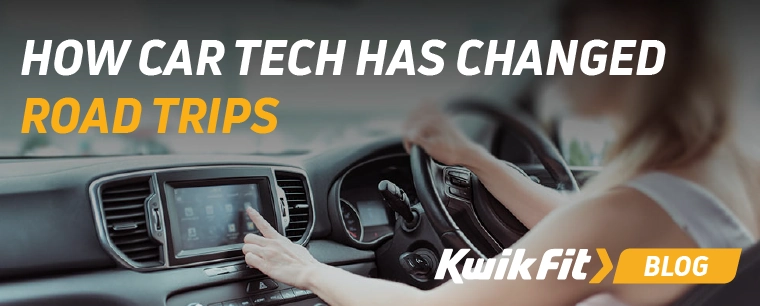 A woman using a car touch screen