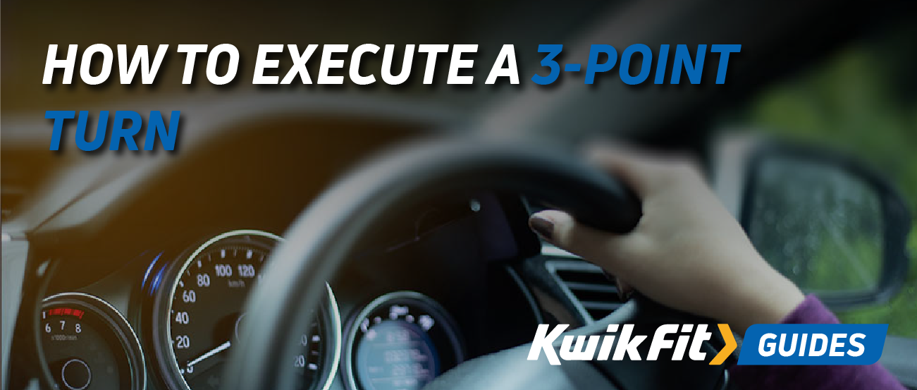 Someones hand on the wheel