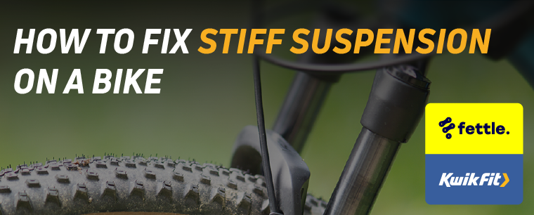 a close up of the suspension on a bike